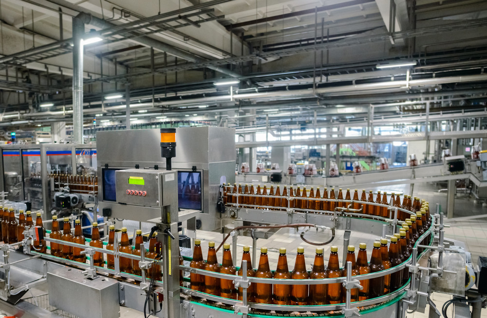 conveyor bottle filling in factory